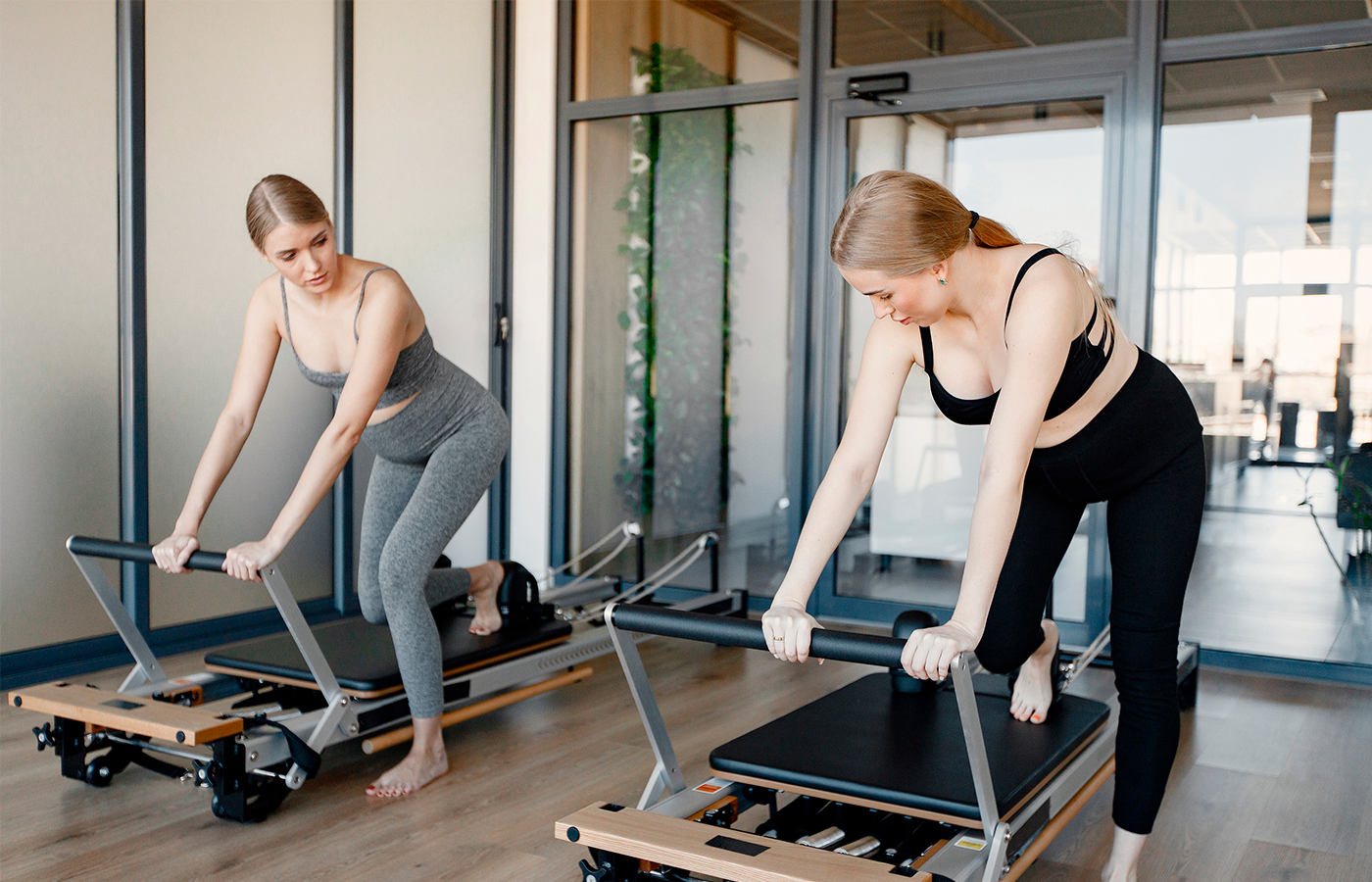 A family workout using Pilates reformers